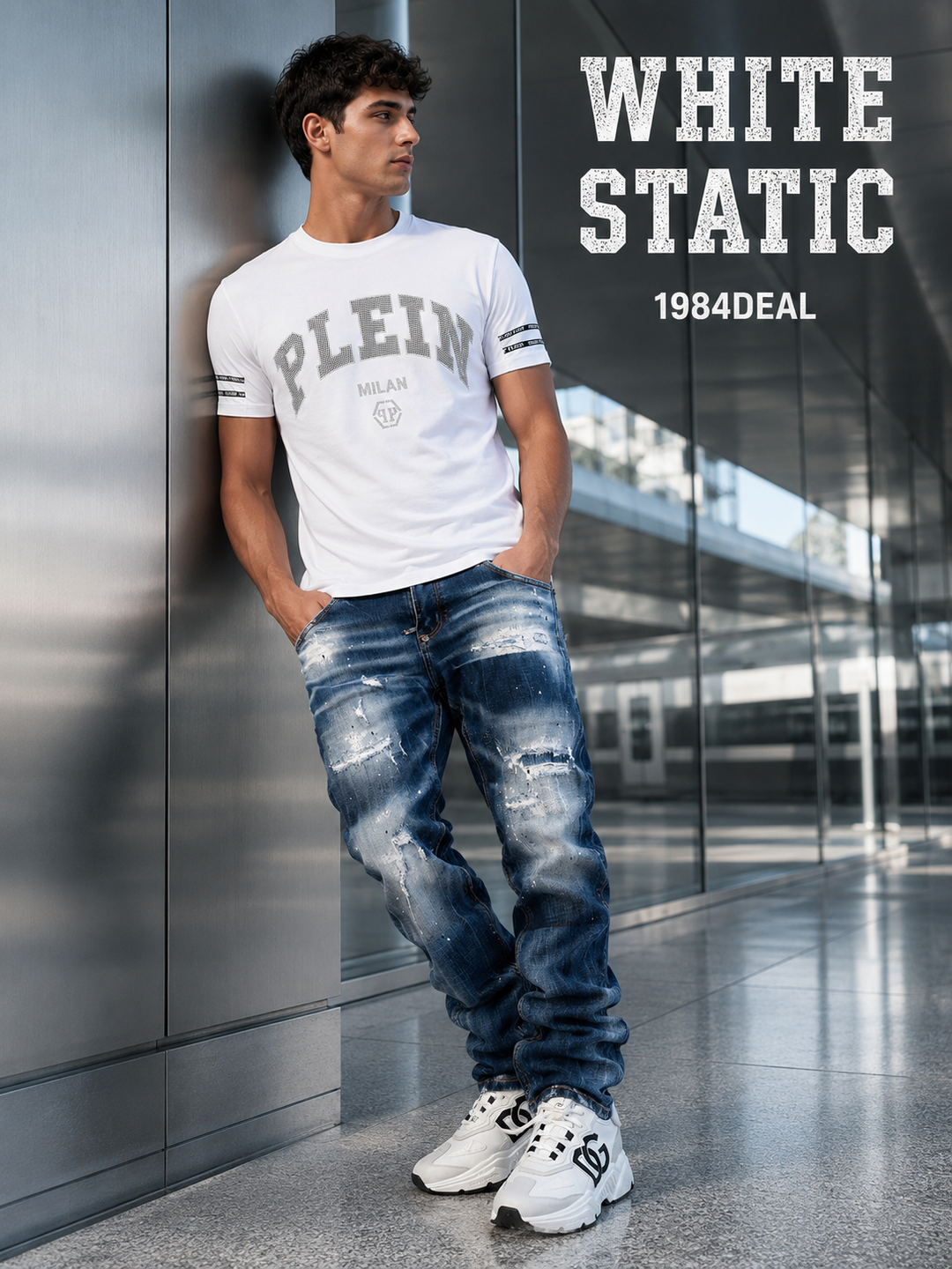 Man wearing a white block-letter T-shirt, distressed blue jeans and chunky white sneakers