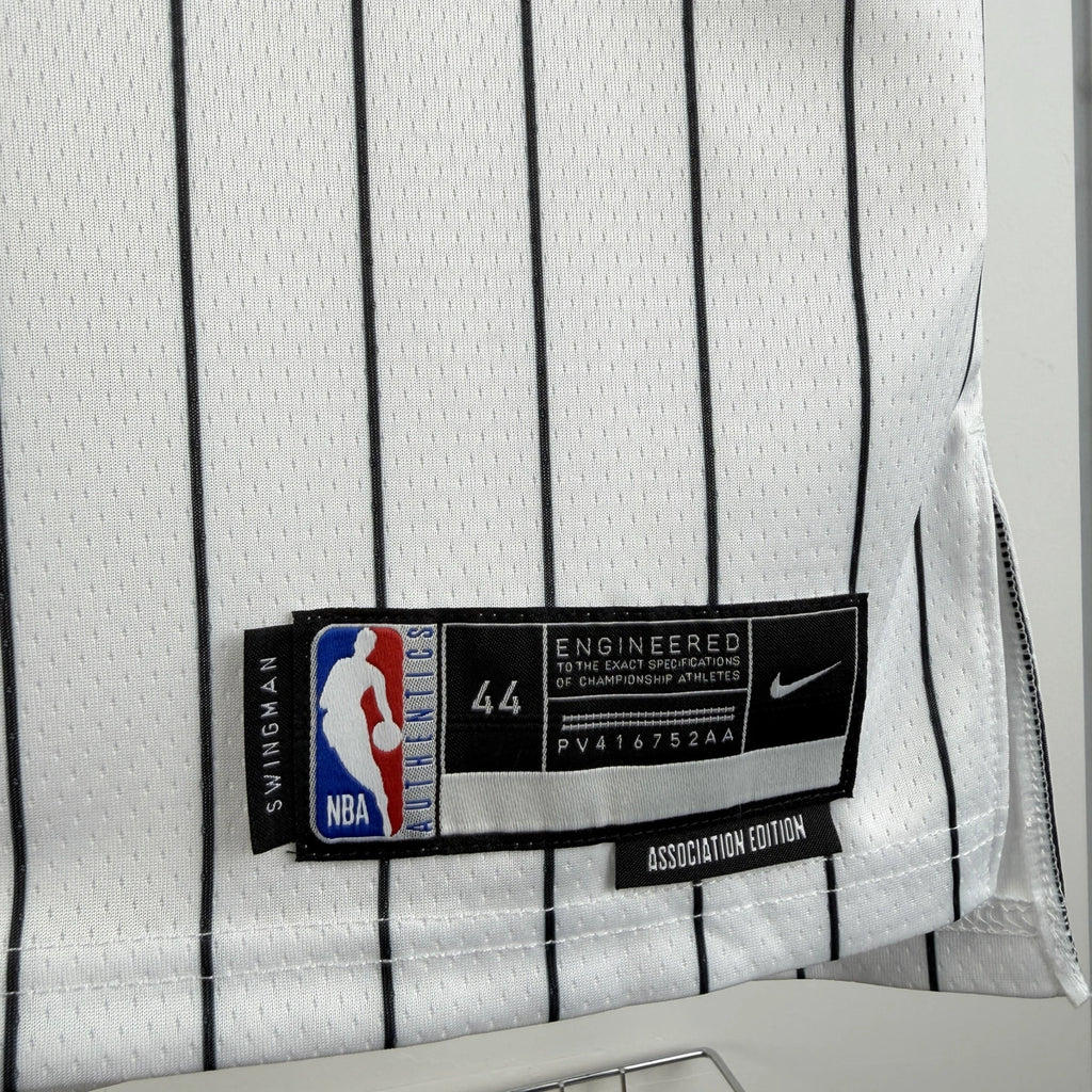Orlando Magic 2025-26 home basketball jersey angled back view in white for basketball fans