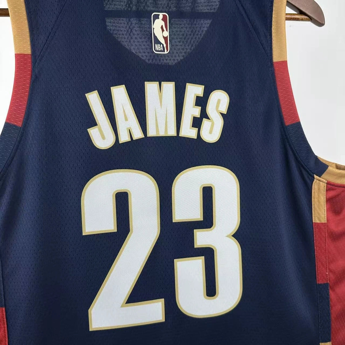Cleveland Cavaliers 2025-26 throwback edition basketball jersey close-up of collar and neckline stitching in team colors for basketball fans