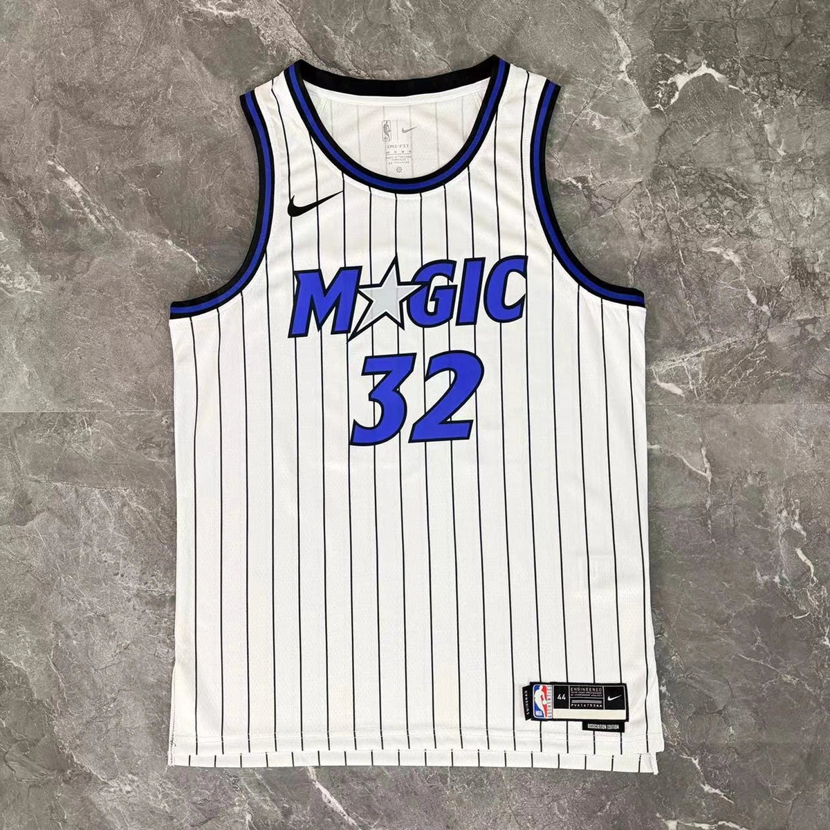 Orlando Magic 2025-26 home basketball jersey close-up of moisture-wicking fabric texture in white for basketball fans