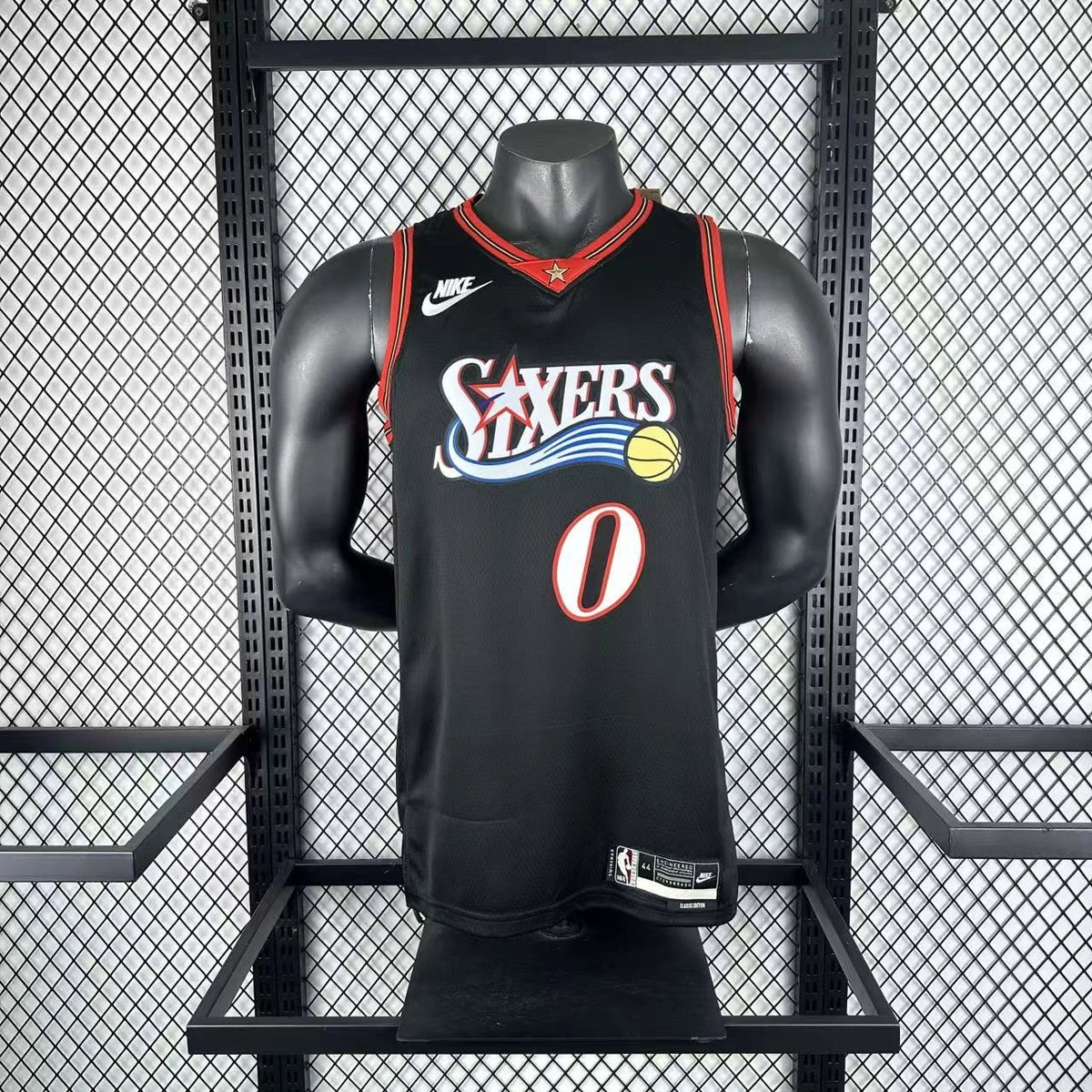 Philadelphia 76ers 2025-26 throwback edition basketball jersey angled front view in black for basketball fans