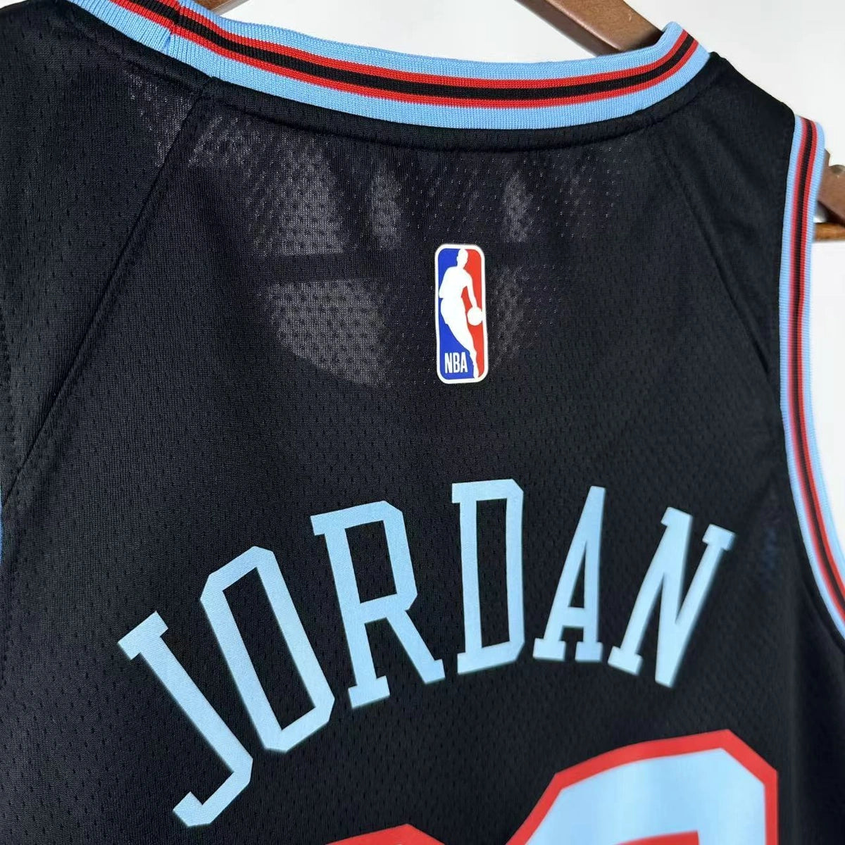 Chicago Bulls 2025-26 city edition basketball jersey close-up of moisture-wicking fabric texture in team colors for basketball fans