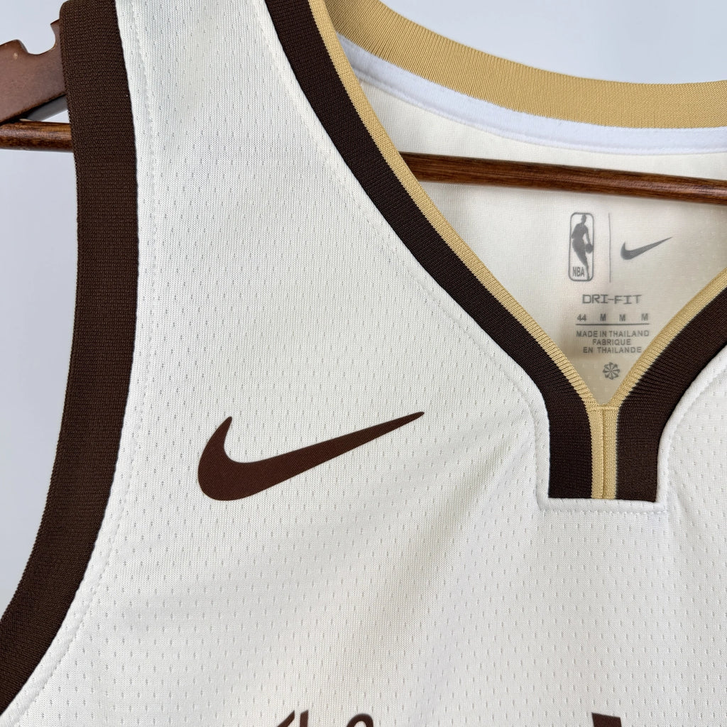 Golden State Warriors 2025-26 city edition basketball jersey angled front view in team colors for basketball fans