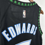 Minnesota Timberwolves 2025-26 throwback edition basketball jersey close-up of moisture-wicking fabric texture in team colors for basketball fans