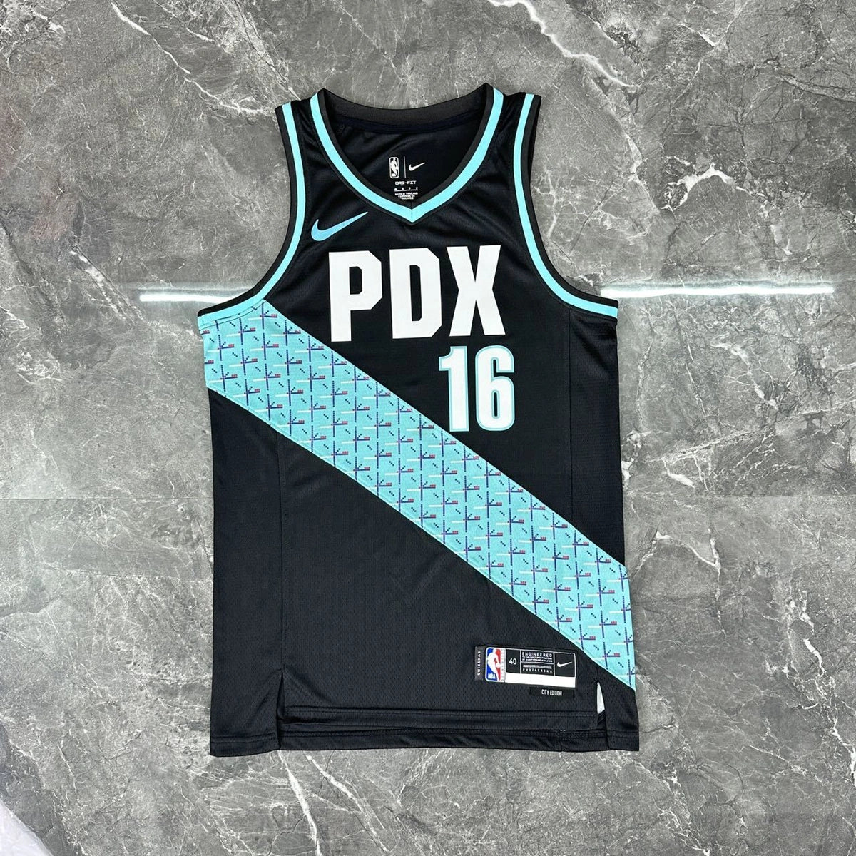 Portland Trail Blazers 2025-26 home basketball jersey angled front view in team colors for basketball fans