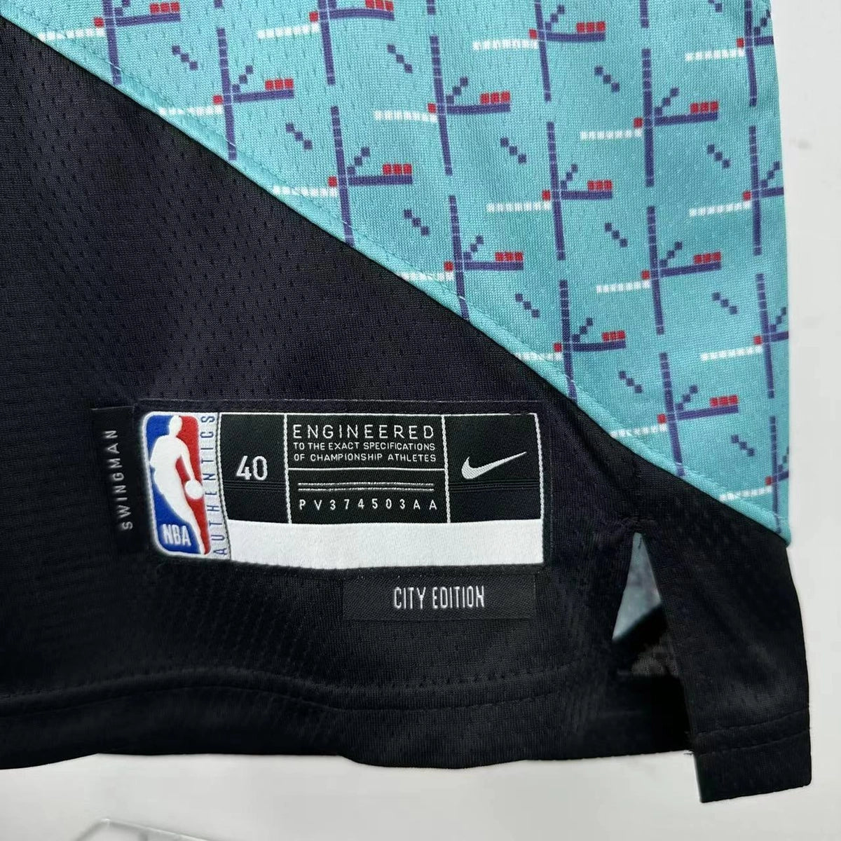 Portland Trail Blazers 2025-26 home basketball jersey side angle view in team colors for basketball fans