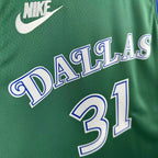 Dallas Mavericks 2025-26 throwback edition basketball jersey close-up of jock tag and hem details in green for basketball fans