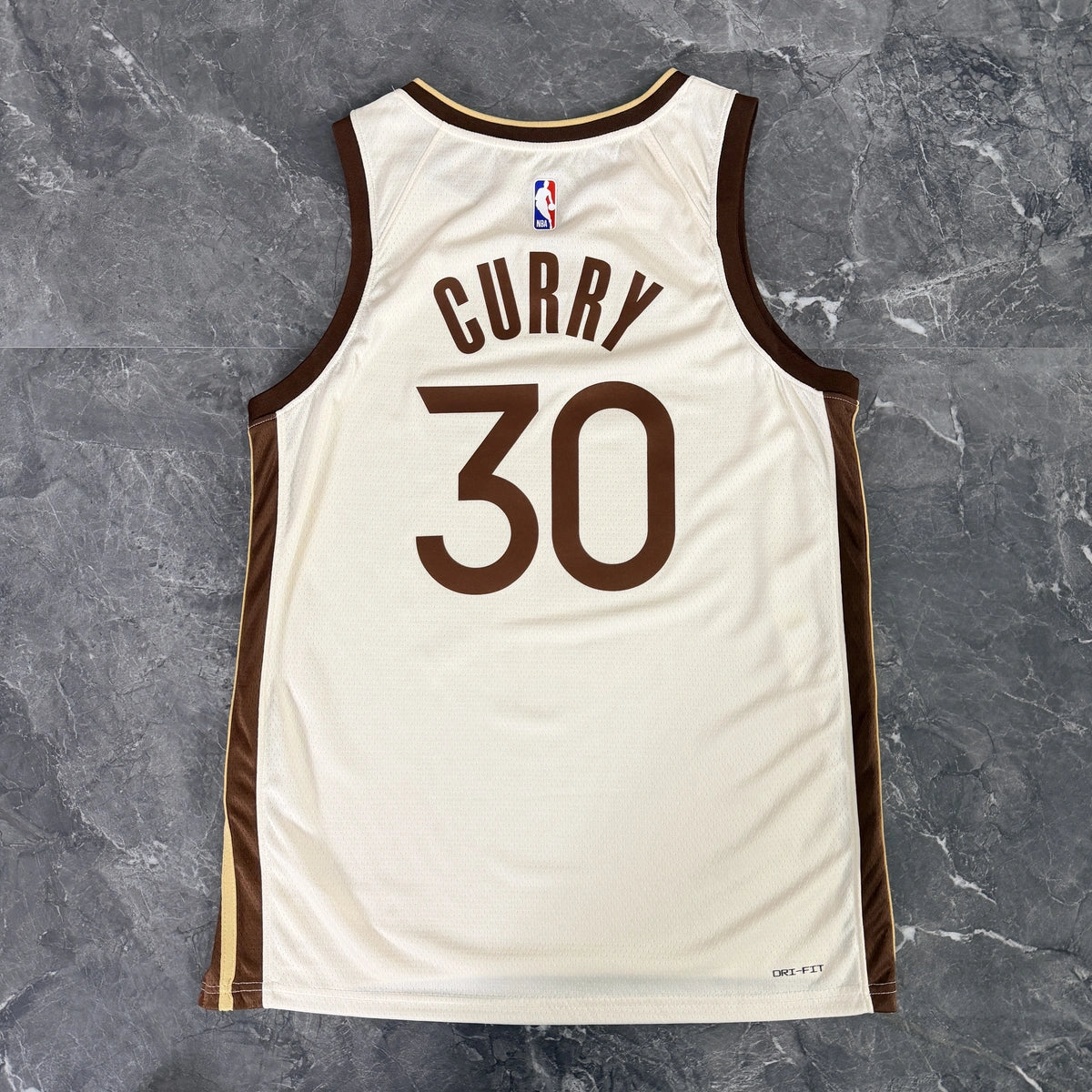 Golden State Warriors 2025-26 city edition basketball jersey close-up of team logo embroidery in team colors for basketball fans