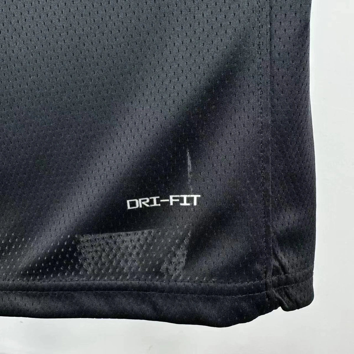 Portland Trail Blazers 2025-26 home basketball jersey close-up of moisture-wicking fabric texture in team colors for basketball fans