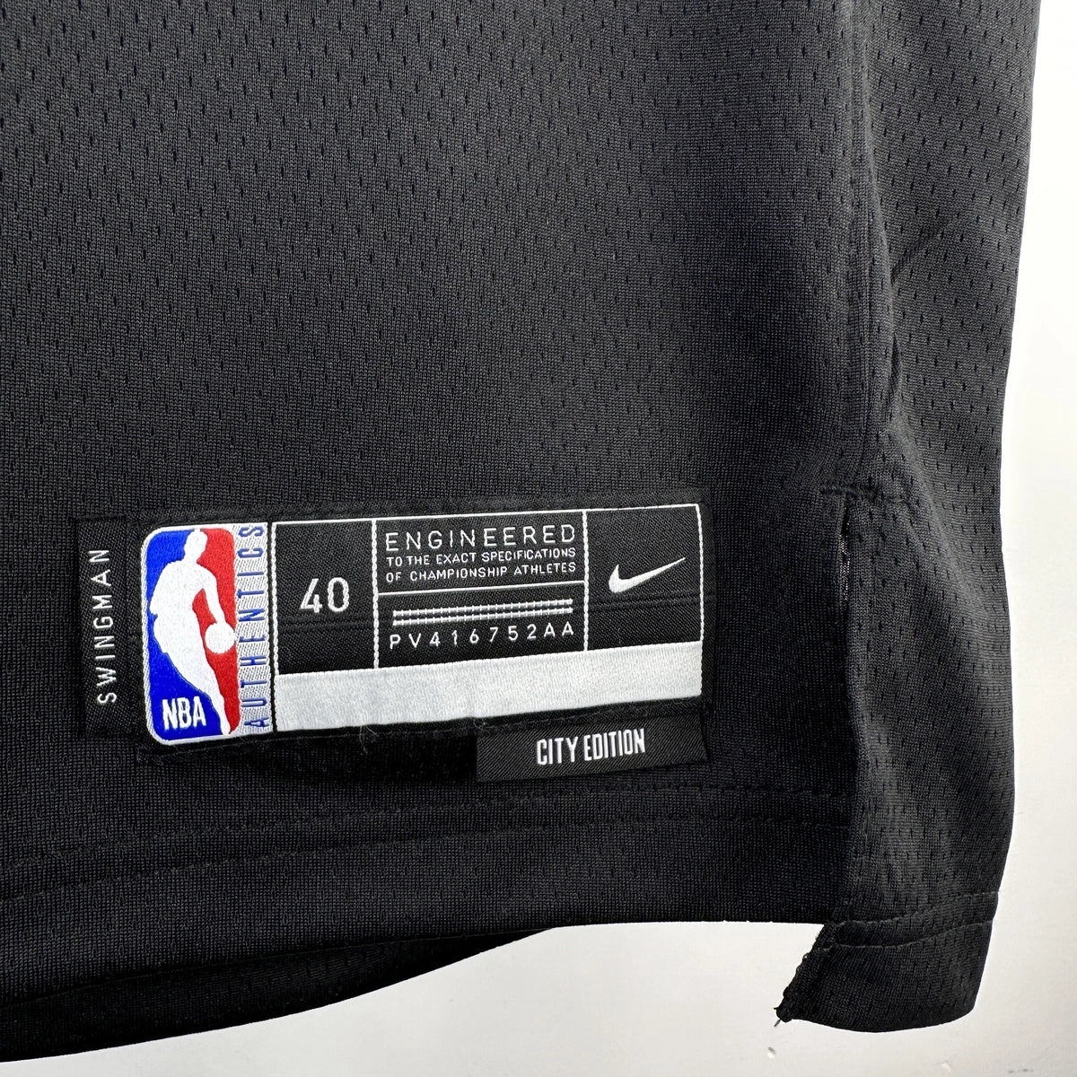 New Orleans Pelicans 2025-26 city edition basketball jersey close-up of jock tag and hem details in team colors for basketball fans