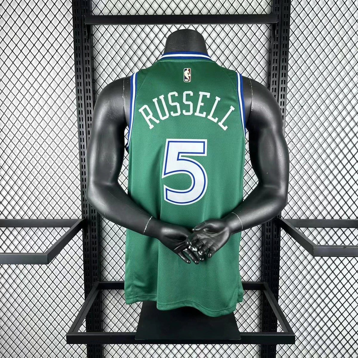 Dallas Mavericks 2025-26 throwback edition basketball jersey angled front view in green for basketball fans