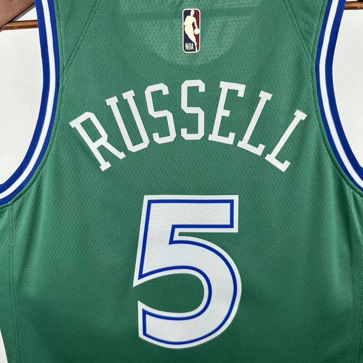 Dallas Mavericks 2025-26 throwback edition basketball jersey close-up of jersey number and player name in green for basketball fans