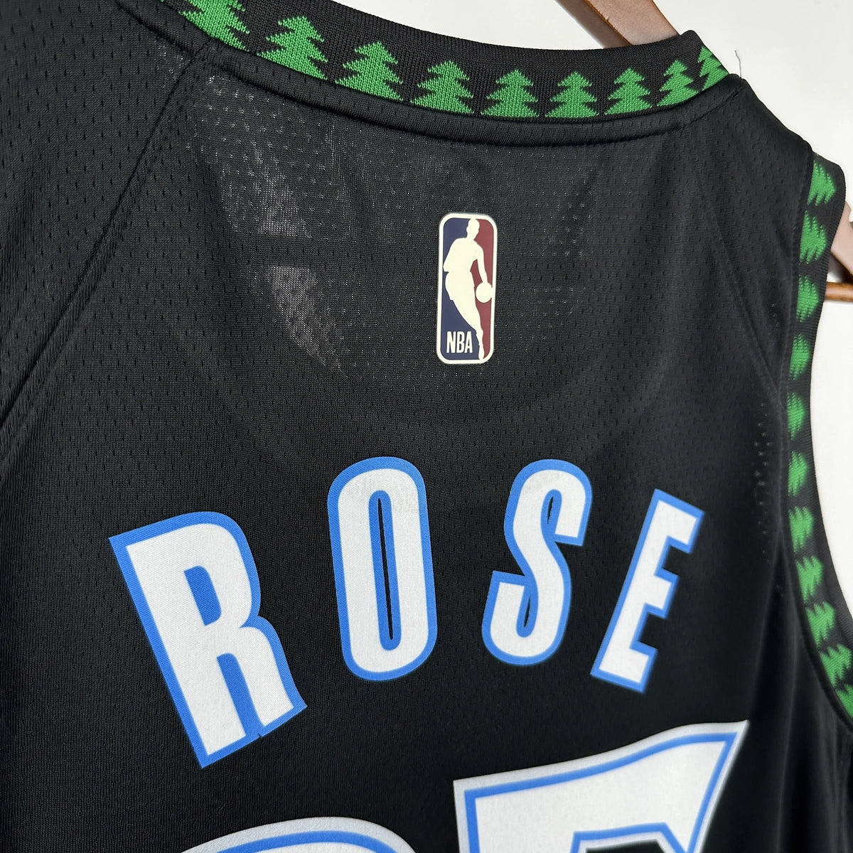 Minnesota Timberwolves 2025-26 throwback edition basketball jersey close-up of team logo embroidery in team colors for basketball fans