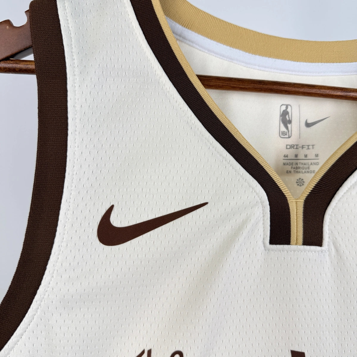 Golden State Warriors 2025-26 city edition basketball jersey close-up of jock tag and hem details in team colors for basketball fans